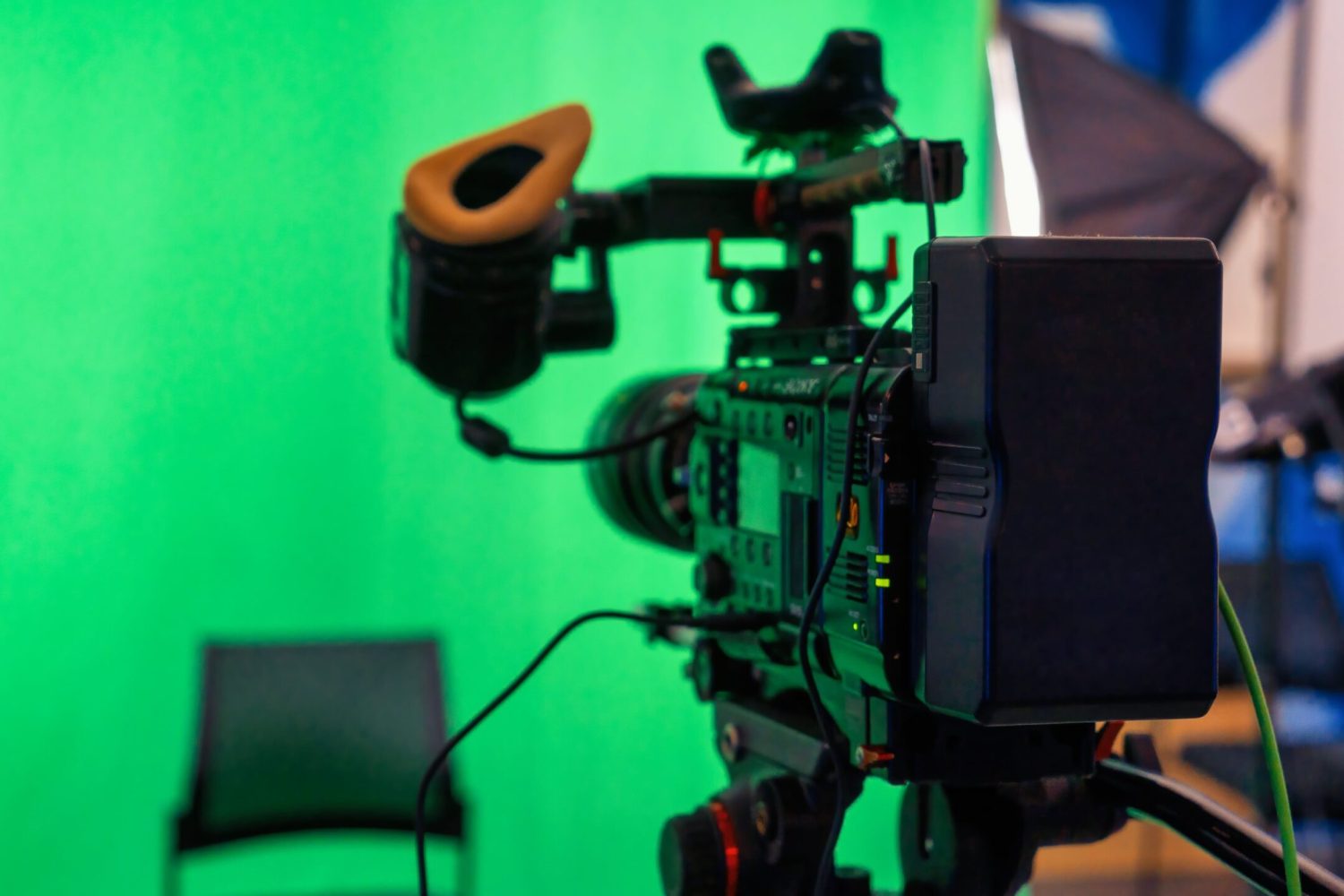 professional-video-camera-stand-with-green-chromakey-studio-min